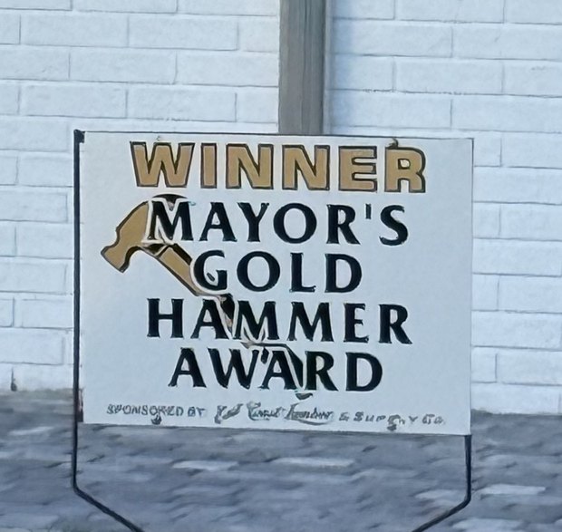 Mayor's Gold Hammer Award sign outside The Chelsea